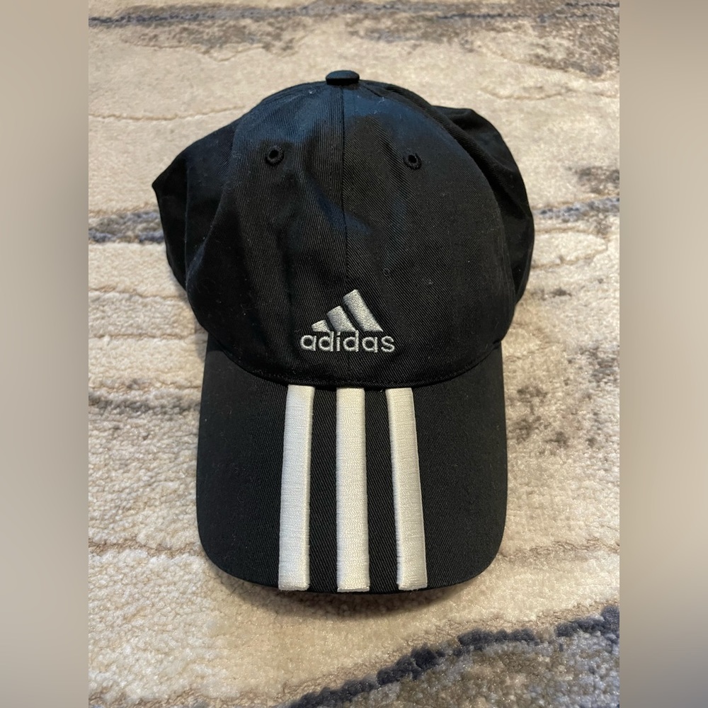 Adidas 100% cotton twill baseball cap with adjustable strap.
